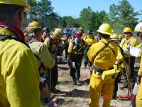 Weaver Listening to the Burn Plan at the Texas Wildfire Academy, October 2003